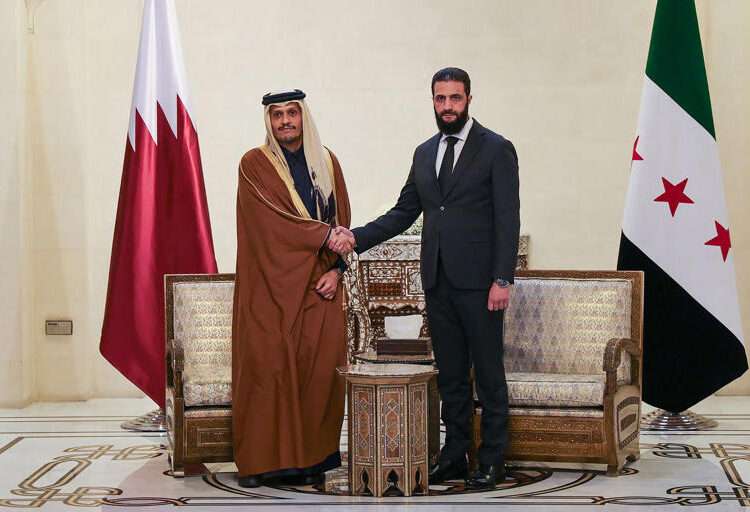Syria Poised To Welcome UN Forces In Buffer Zone With Israel 1 Syria's new leader, Ahmed al-Sharaa, right, welcomes Qatari Prime Minister Sheikh Mohammed bin Abdulrahman bin Jassim Al Thani in Damascus.