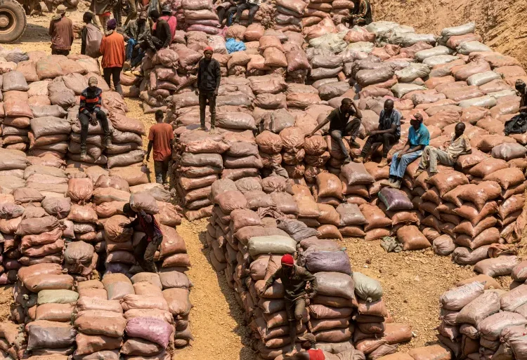 A general view of artisanal miners working at a mine near Kolwezi. Rights groups have flagged human rights abuses in the region