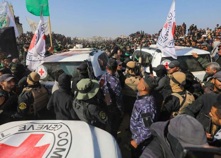 Eight Captives Including Five Foreigners Released In Gaza 1 Arbel Yehoud is handed over to the Red Cross amid chaotic scenes in Khan Younis, Gaza.