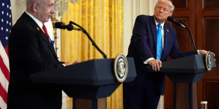 US President Donald Trump and Israel's Prime Minister Benjamin Netanyahu speak during a news conference in the East Room of the White House in Washington, DC.