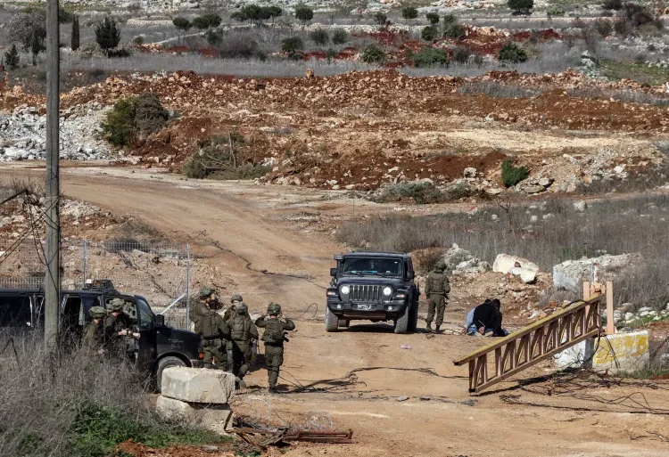Israeli Army Announces Decision To Remain In Five Locations Across Southern Lebanon 1 Israeli soldiers are deployed near the Israeli-Lebanese border during a ceasefire between Israel and Hezbollah on January 27, 2025.