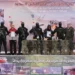 Hamas Releases Captives In Final Swap Under Ceasefire’s First Phase 12 Israeli captives Tal Shoham, second from left, and Avera Mengistu, fourth from right, are flanked by Hamas fighters as they stand on a stage during their release in Rafah, Gaza.