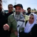 Israel Frees Palestinian Prisoners After 3 Captives Released In Gaza 12 A freed Palestinian prisoner reacts in Ramallah as Palestinian prisoners are released.