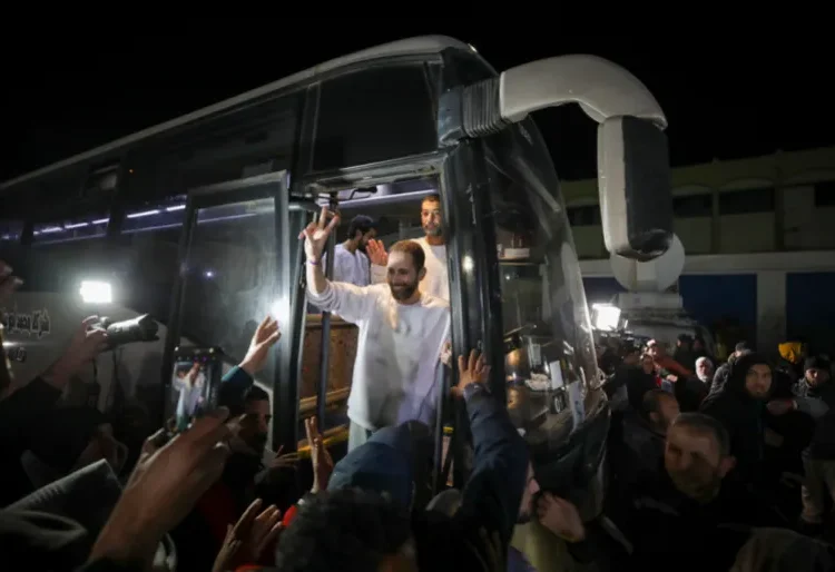 Gaza Ceasefire Future Uncertain 1 Freed Palestinian prisoners flash V-signs as they arrive in Khan Younis, Gaza Strip, February 27, 2025.