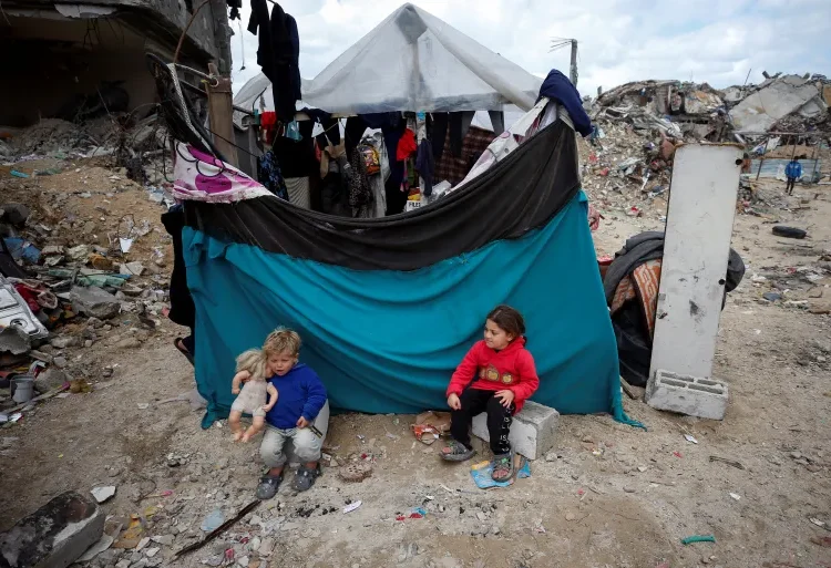 Gaza To See More Death and Desolation 1 Palestinian children play in the rubble in Jabalia refugee camp in northern Gaza.