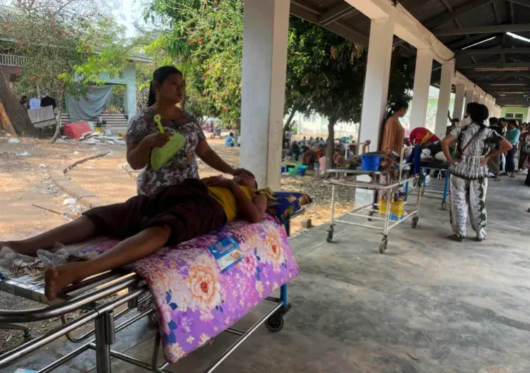 Injured people are treated in an open area of a hospital after an earthquake in Naypyidaw, Myanmar as Hospitals In Myanmar Struggle With Influx Of Injured People.