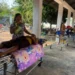 Injured people are treated in an open area of a hospital after an earthquake in Naypyidaw, Myanmar as Hospitals In Myanmar Struggle With Influx Of Injured People.