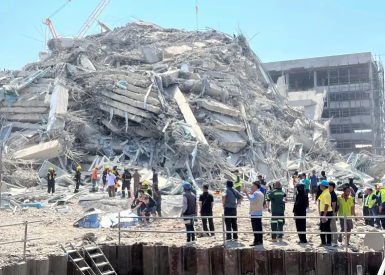 WHO Triggers Emergency System For Myanmar Quake 1 Rescuers work at the site of a collapsed building after the tremors of a strong earthquake that struck central Myanmar affected Bangkok, Thailand, March 28, 2025.