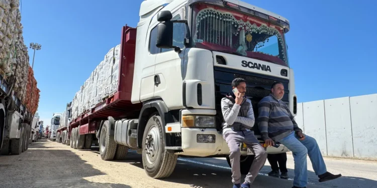 Israel Halts Entry Of Humanitarian Supplies Into Gaza 1 Trucks carrying humanitarian aid line up on the Egyptian side of the Rafah border crossing with the Gaza Strip