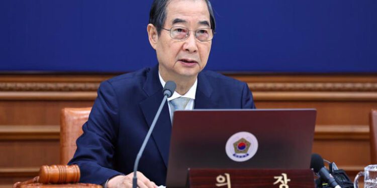 South Korea Sets Snap Election Date 1 South Korea's former acting President, Han Duck-soo as South Korea Appoints New Acting Leader