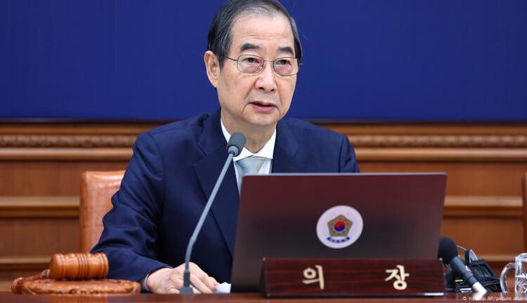 South Korea Sets Snap Election Date 1 South Korea's former acting President, Han Duck-soo as South Korea Appoints New Acting Leader