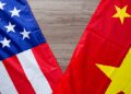 US and China Flags as US, China Agree To Cut Tariffs