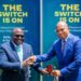 Hon. Julius Debrah recieves his chip-embedded passport from Hon. Samuel Okudzeto Ablakwa, Minister of Foreign Affairs