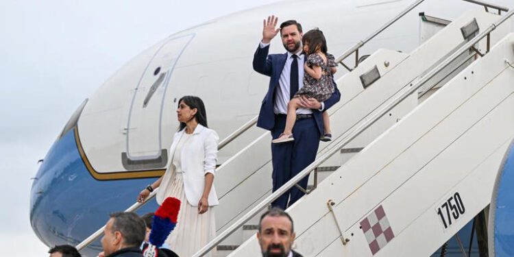 JD Vance and the second lady, Usha, disembarking from Air Force Two as Vance Lands In India For Talks