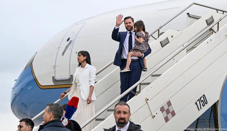 Vance Lands In India For Talks 1 JD Vance and the second lady, Usha, disembarking from Air Force Two as Vance Lands In India For Talks