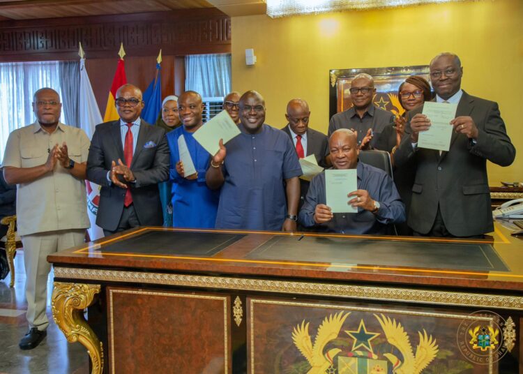 Ghana Celebrates Landmark Economic Gains 1 Picture of HE President John Dramani Mahama and other Government Officails signing landmarks bills