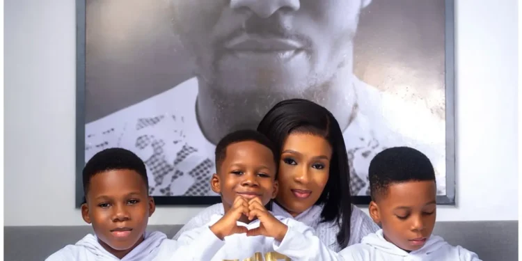 The late Junior Pope's wife and children