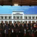 Chinese Foreign Minister Wang Yi, center, attends the signing ceremony of “the Convention on the Establishment of the International Organization for Mediation”, in Hong Kong, Friday, May 30, 2025.