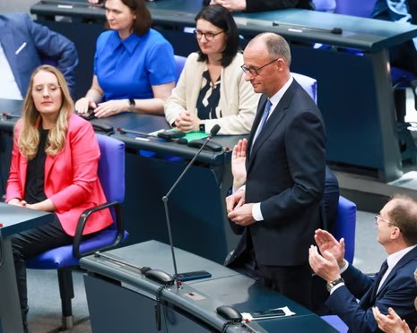 Merz Elected Chancellor At Second Attempt 2 Newly-elected German chancellor, Friedrich Merz (standing), receives applause after the second round of voting at the Bundestag in Berlin.