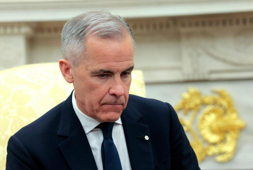 Canadian Prime Minister Mark Carney attends a meeting with US President Donald Trump in the Oval Office at the White House on May 6 in Washington, DC. 
