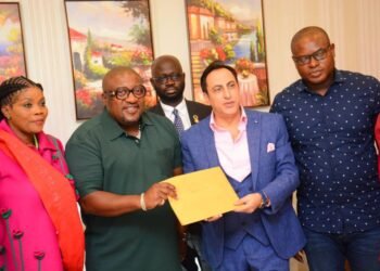 The Dean of the Diplomatic Corps and Ambassador of Lebanon to Ghana, H.E. Maher Kheir, receiving the petition from the representatives of the coalition of Political Parties