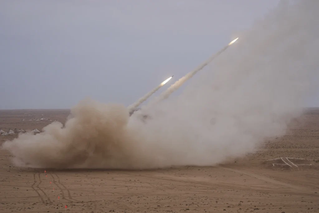 U.S. Urges African Allies To Shoulder Security Burden 2 Launch trucks fires High Mobility Artillery Rocket System