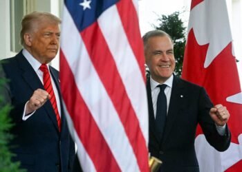 President Donald Trump greets Canadian Prime Minister Mark Carney as he arrives at the White House in Washington, DC, on May 6.
