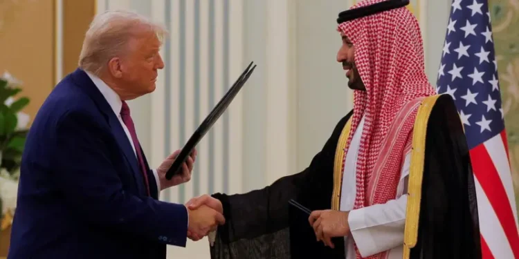 Donald Trump and Saudi Crown Prince Mohammed bin Salman shake hands as US, Saudi Arabia Ink $142bn Defense Sales Agreement