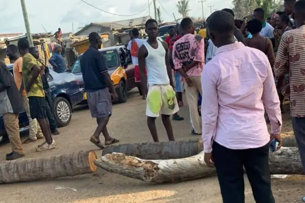 residents manning the roadblock to prevent motorists from crossing