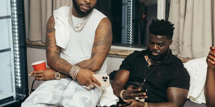 Davido Gifts Personal Assistant Lati Range Rover as Birthday Gift 1 Davido and Lati