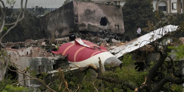 Parts of an Air India plane that crashed on Thursday are seen on top of a building in Ahmedabad, India, Friday, June 13, 2025.