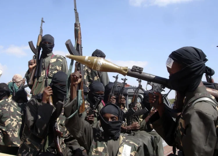 Al-Shabab Fighters Seize Key Somali Town Mahaas 1 Armed al-Shabab fighters ride on pickup trucks as they prepare to travel into the city.