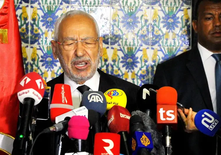 Ghannouchi has refused to appear in court