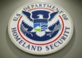 The Department of Homeland Security logo is seen during a news conference in Washington
