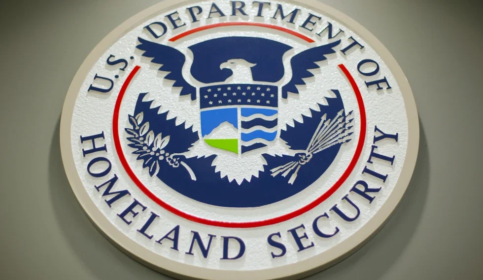 US Sends “Barbaric” Criminals to Eswatini Amid Deportation Clash 1 The Department of Homeland Security logo is seen during a news conference in Washington