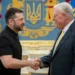 Ukrainian President Volodymyr Zelenskyy, left, shakes hands with United States Special Envoy for Ukraine and Russia, Joseph Keith Kellogg in Kyiv, Ukraine, Monday, July 14, 2025.