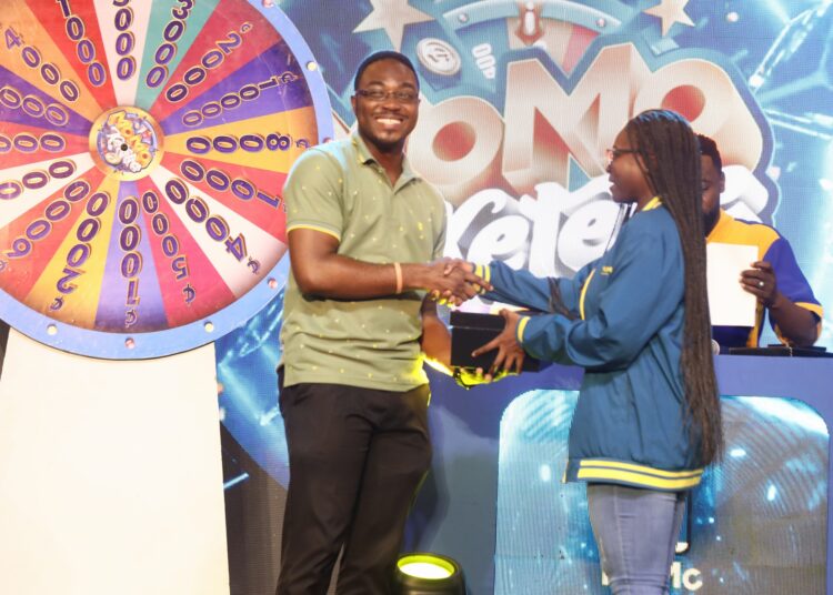 MoMofest Launch at Bukom Dazzles With Discounts, Games & Big Wins 1 Overrall Winner of Gamenight taking his reward