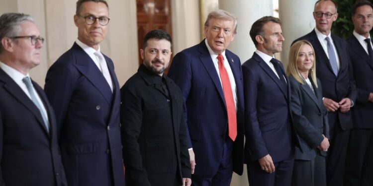 Divergence Remains Over Ceasefire In Ukraine 1 President Donald Trump and Ukrainian President Volodymyr Zelensky pose for a picture with European leaders following a meeting at the White House.