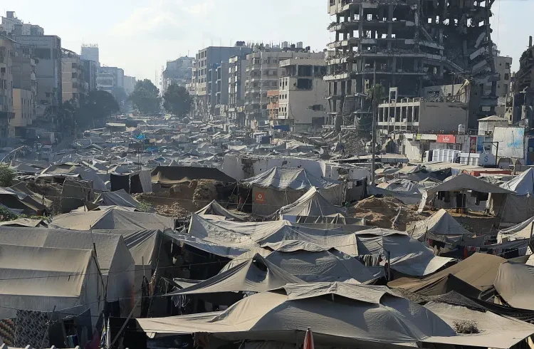A makeshift encampment of tents has sprung up in Gaza City to shelter people displaced by the Israeli campaign.