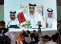 Qatar's Emir Vows Economic Resilience Amid Regional Crisis 10 Journalists watch on a screen at the media center as Sheikh Tamim bin Hamad Al Thani, the emir of Qatar, speaks
