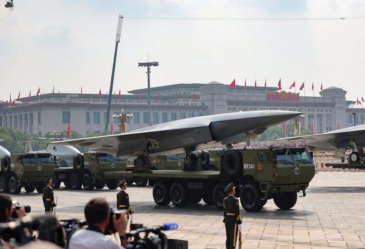China Flexes Military Muscle In Show Of Growing Clout 1 Members of the People's Liberation Army stand as the unmanned operations group display drones during a military parade to mark the 80th anniversary of the end of World War Two, in Beijing, China, September 3, 2025.