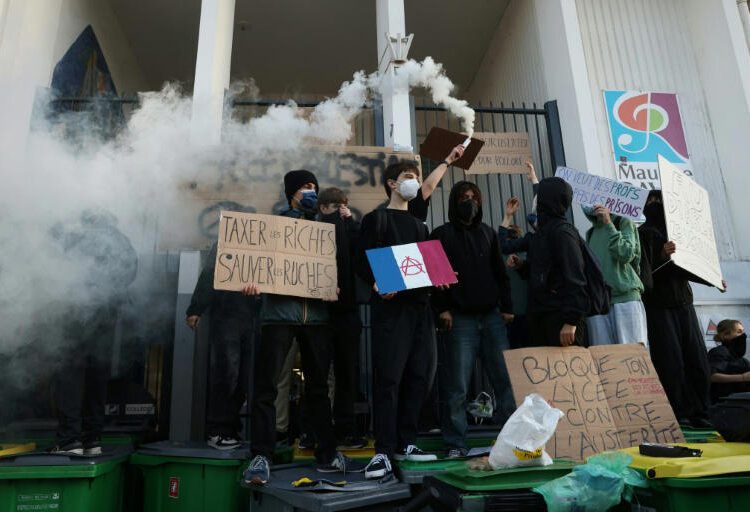 Nationwide Strike Grips France 1 Pupils in France blocked the entrance to their school.