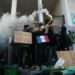Pupils in France blocked the entrance to their school.