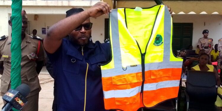 Achiase DCE Launches Pragya Association to Promote Safety, Order, and Hygiene Among Riders 1 Hon Samuel Owusu Brako launching the Achiase Pragya Association