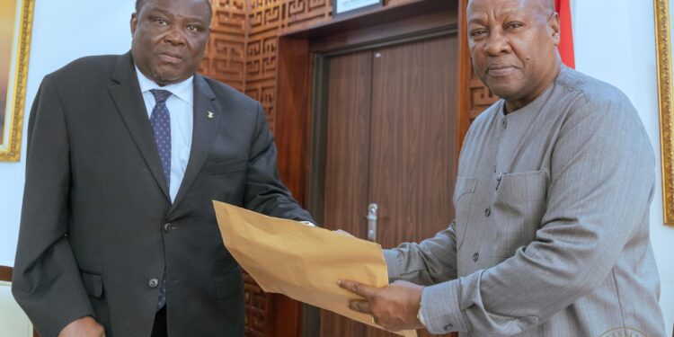 President Mahama Receives First Report on CJ's Removal Inquiry 1 President Mahama receiving the Committee's report from Justice Gabriel Pwamang Scot