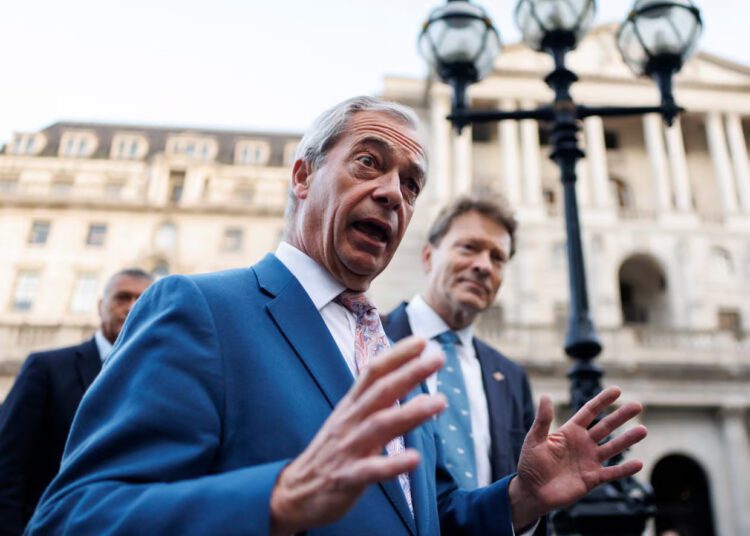 Farage Pressures Bank Of England Over Bonds 1 Nigel Farage and Reform UK MP Richard Tice outside the Bank of England.