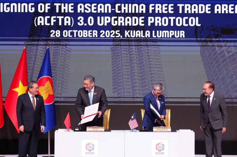 China, ASEAN Upgrade Free Trade Agreement 2 2025 10 28T020619Z 1586866949 RC2PKHA5D11Q RTRMADP 3 ASEAN SUMMIT 1761624746