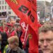 People march with signs during a general strike in Brussels, 14 October, 2025.