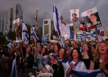 People applauding and cheering in Tel Aviv’s ‘Hostage Square’ as news breaks that the first seven captives are on their way back to Israel.