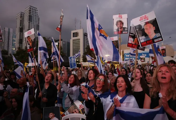 Israel Receives Seven Captives Under New Ceasefire Deal 1 People applauding and cheering in Tel Aviv’s ‘Hostage Square’ as news breaks that the first seven captives are on their way back to Israel.